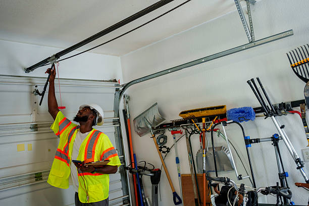 Professional Garage Door Panel Replacement technician working in Calverton, NY